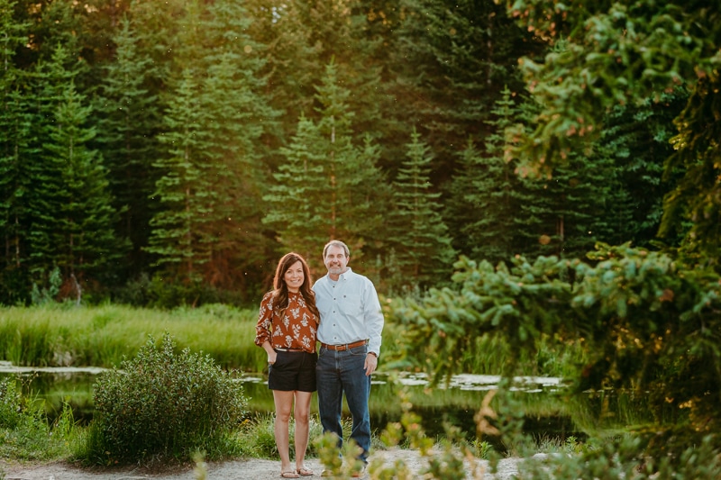 Couples photographer, a man and woman stand together in the forest