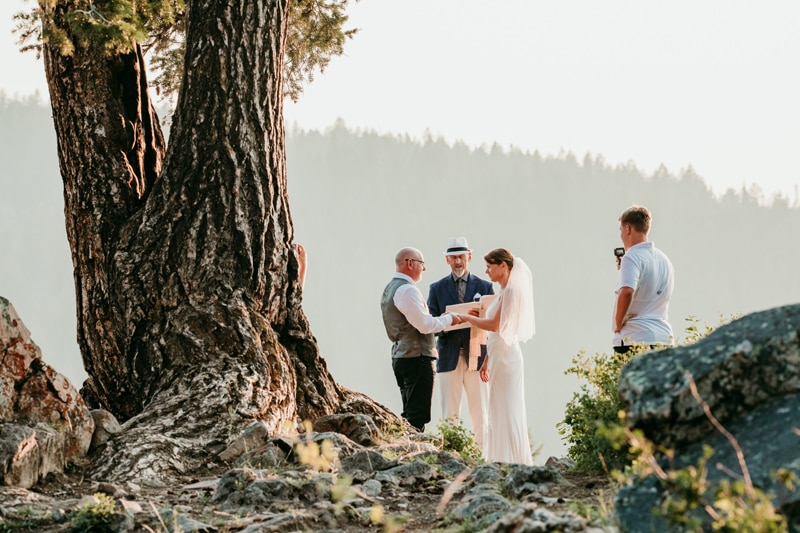 Wedding Photography, a husband and wife exchange vows in elopement in the mountains
