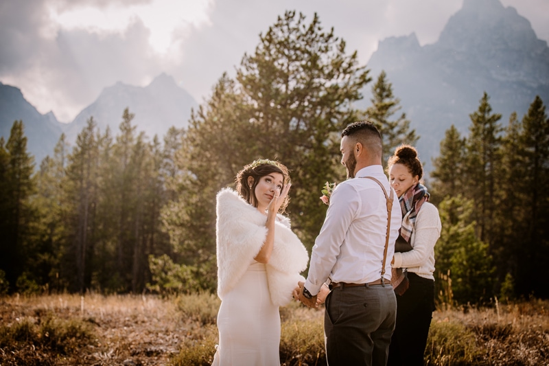 Wedding Photography, a bride cries happy tears during her quiet mountainside elopement